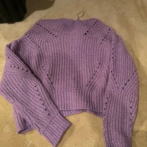 Sweater with small cut outs
